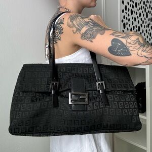 FENDI
Zucchino Mama Baguette Bag
